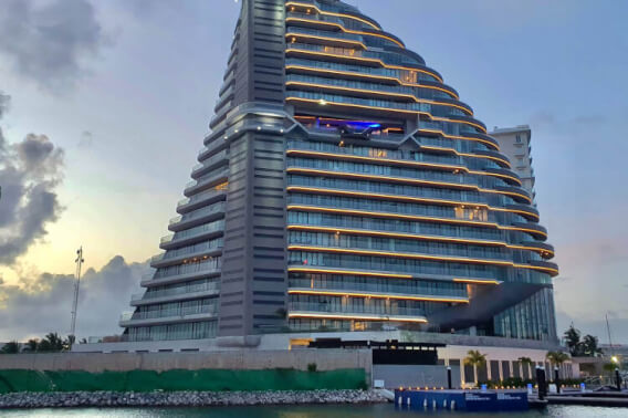 Luxury penthouse with ocean and marina views, with amenities: infinity pool, spa, gym, lounge area, event room, lobby, in Puerto Cancun