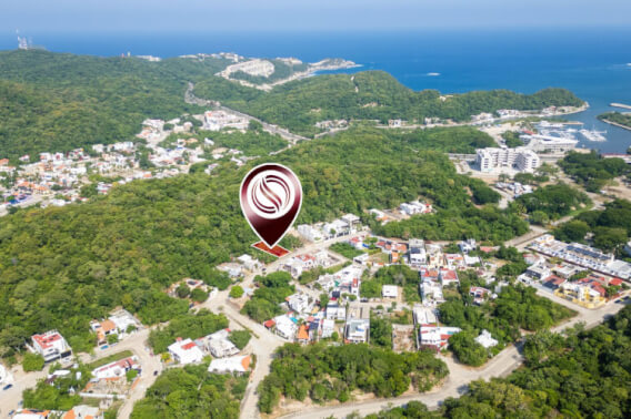 Residential lot bordering a natural area, just minutes from the beach, for sale