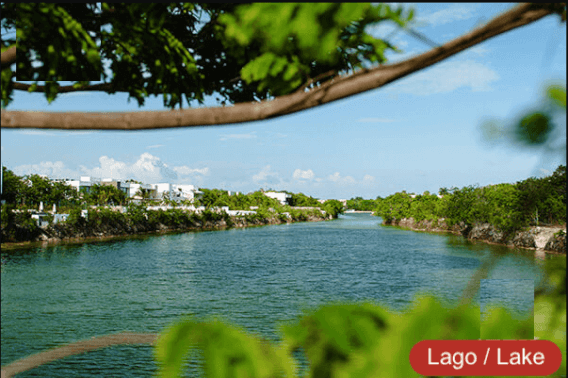 Residential land 1,003 m2 in front of a park, in gated community with exclusive amenities and clubhouse, for sale in Lagos del Sol, Cancun.