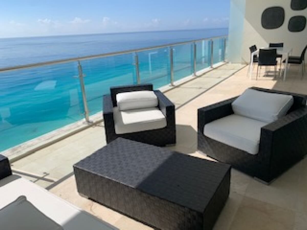 Luxury penthouse with ocean and marina views, with amenities: infinity pool, spa, gym, lounge area, event room, lobby, in Puerto Cancun