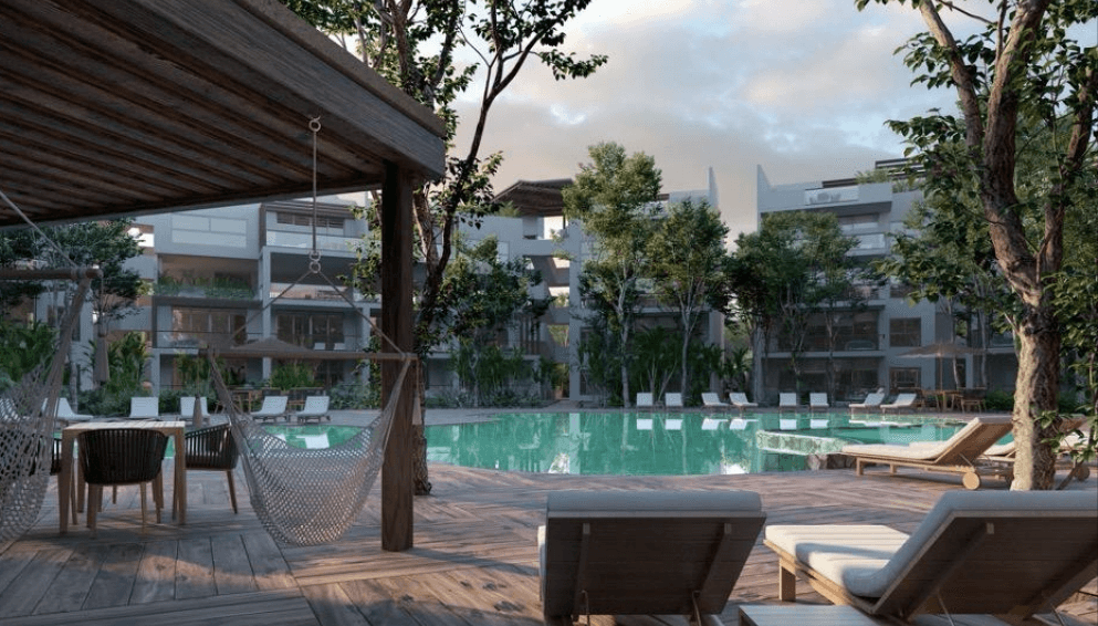 Condo with panoramic windows, surrounded by trees, 958 m2 pool, yoga, gym, swim lane, sustainable building, pre-construction, sale in Tulum