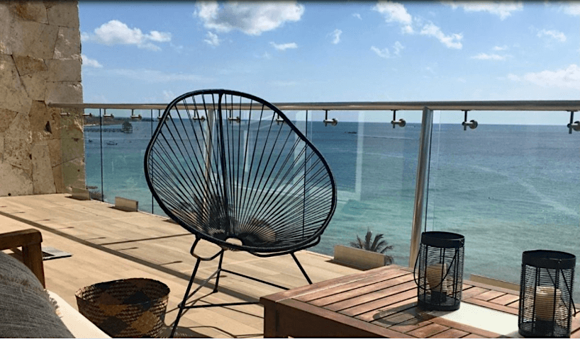 Apartment near the boardwalk, terrace with ocean view pool for sale Cozumel
