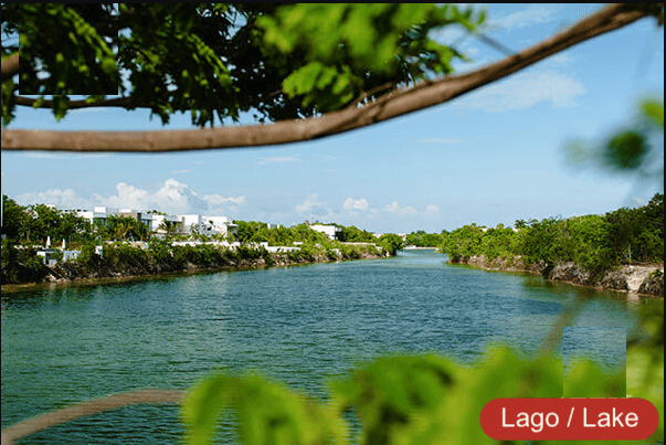 Residential land 1,003 m2 in front of a park, in gated community with exclusive amenities and clubhouse, for sale in Lagos del Sol, Cancun.