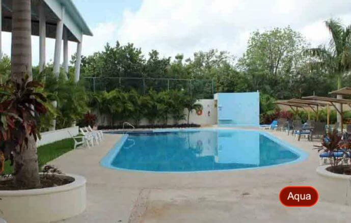 House with private pool &amp; rooftop terrace, clubhouse with sports fields, in Gated community, ¨Aqua¨, Cancun, for sale.