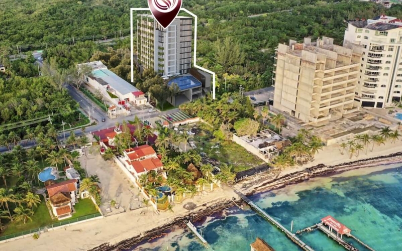 Apartment with smart home system, 50 meters from the sea, in Costa Mujeres, for sale.