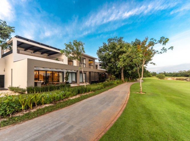 Residence with garden and private pool, in community with golf course and luxury amenities in Yucatan Country Club for sale.