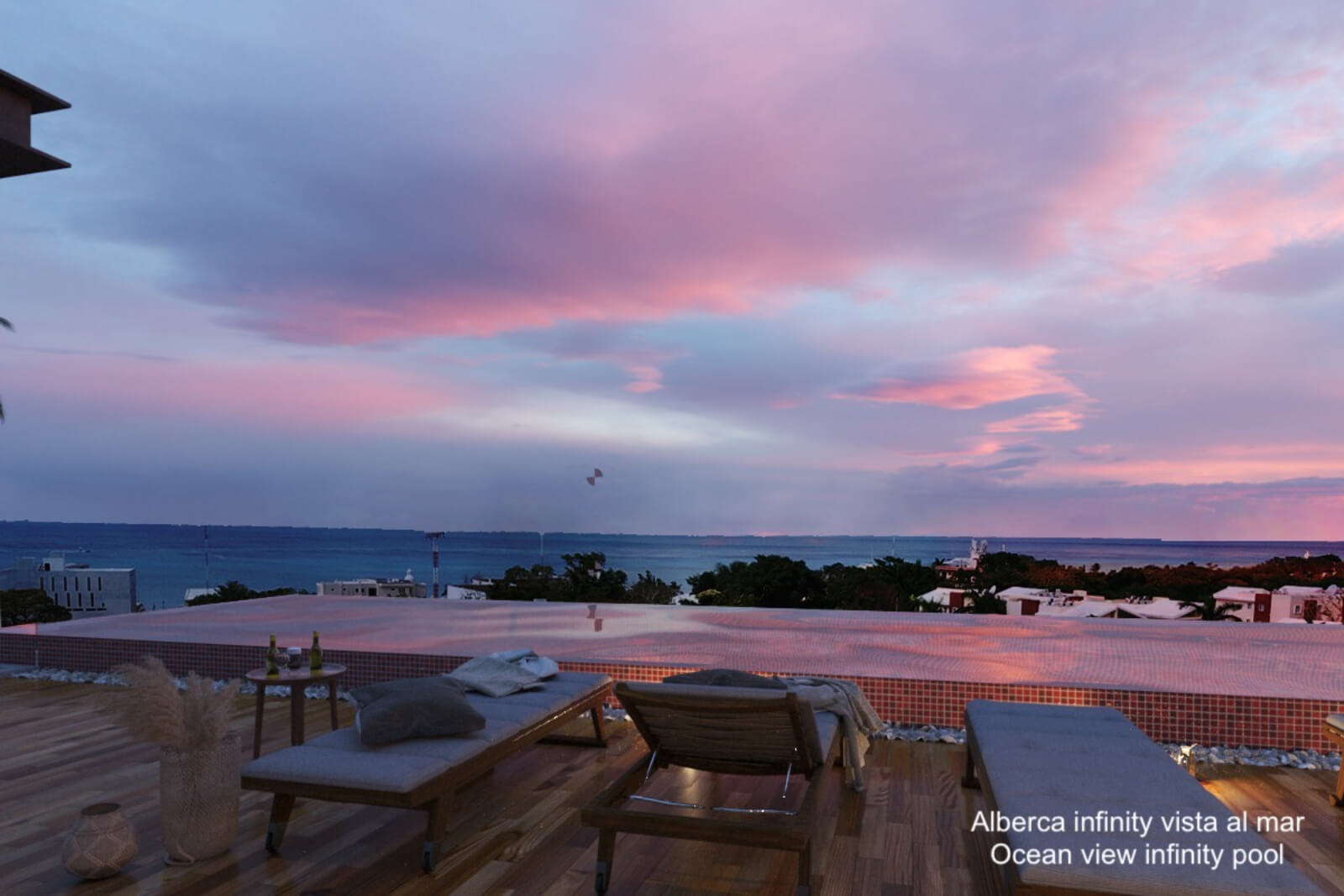 Apartment near the boardwalk, terrace with ocean view pool for sale Cozumel.