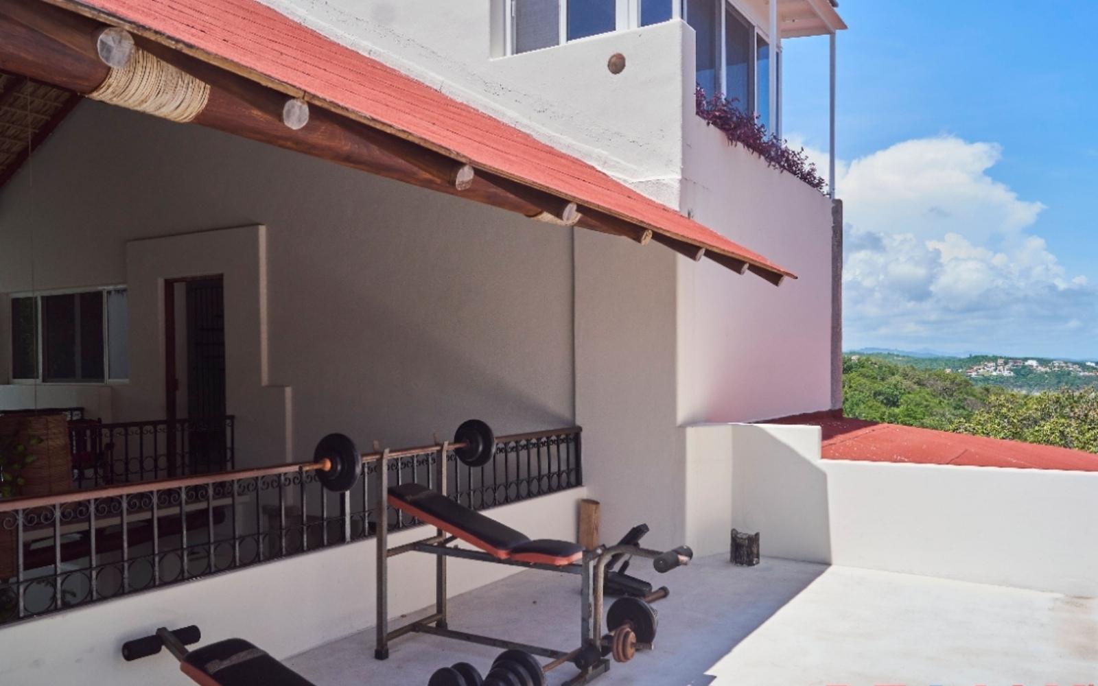 Luxury Beachfront villa, beach club and hotel services, private pool, elevator, in Tangolunda Bay Huatulco, for sale.