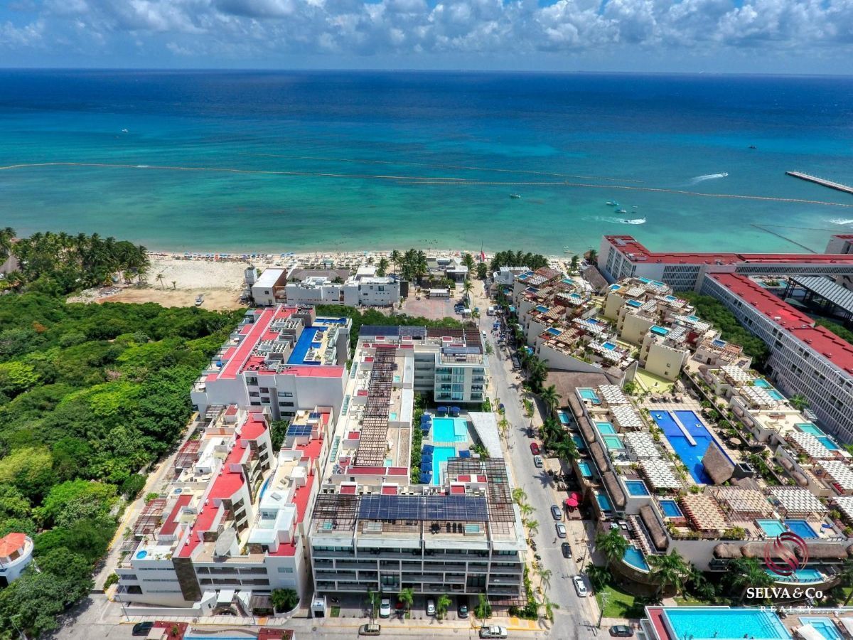 Departamento, a 100 metros del mar vista al mar rooftop con alberca infinity, bar deportivo, Spa, Sky bar, venta Playa del Carmen.