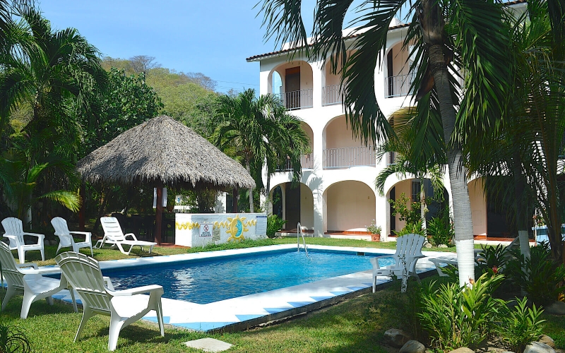 Apartment steps from the beach, pool, palapa, furnished, for sale Santa Cruz, Huatulco.