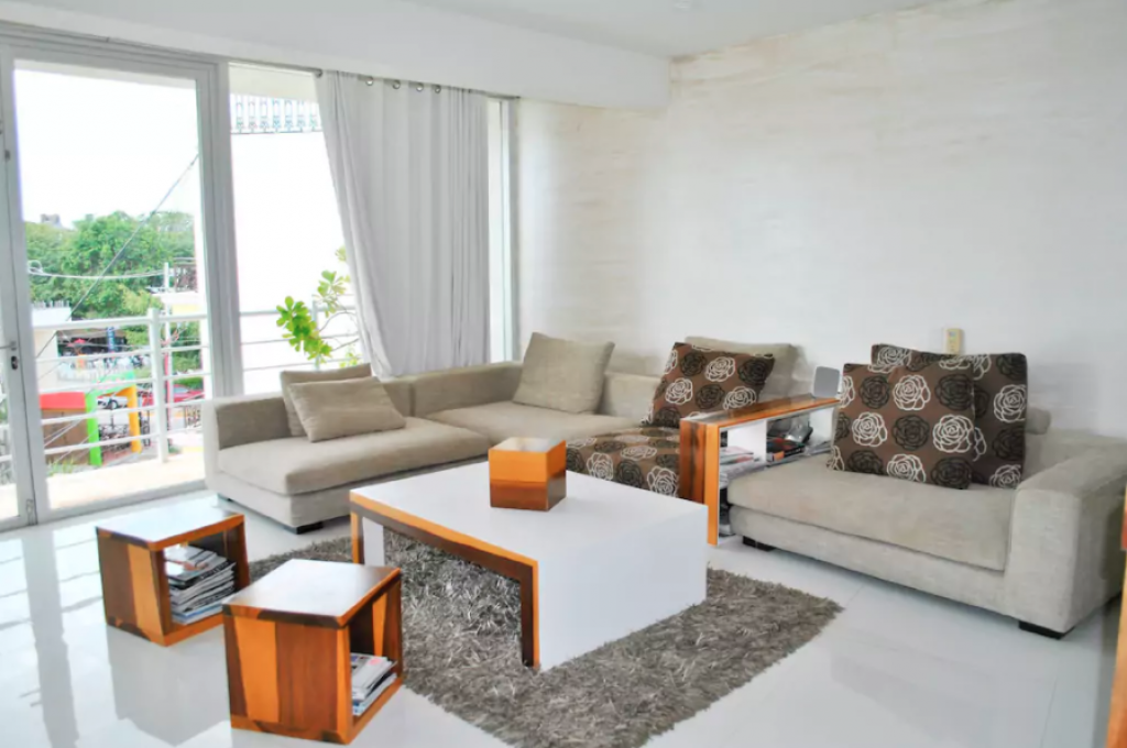 Two-story oceanfront penthouse with pool, pre-sale Playa del Carmen.