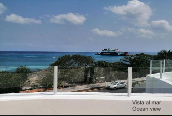 Beachfront apartment with rooftop and private pool for sale in Cozumel