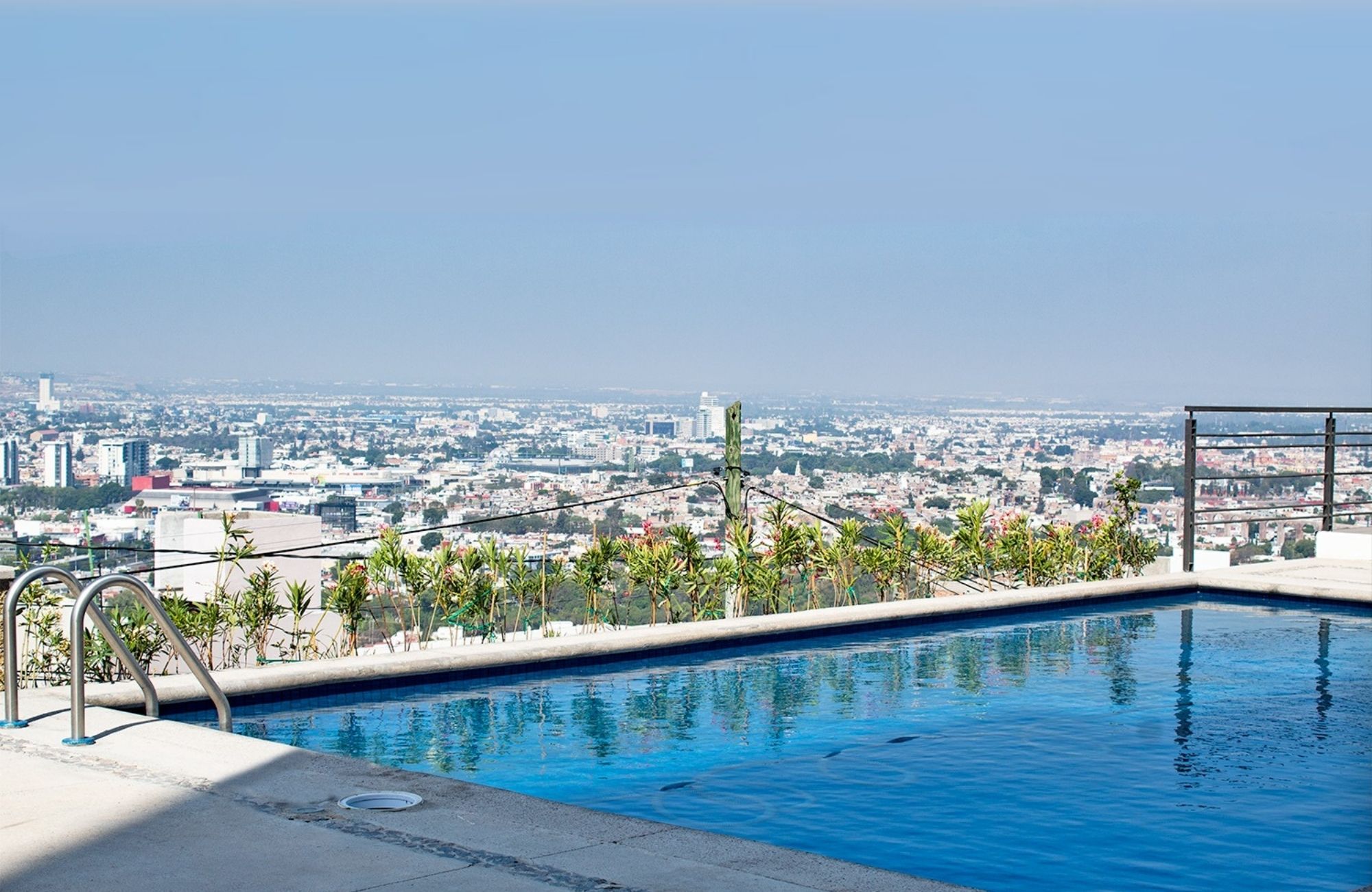 Condominium with large garden, pool, terrace, pet friendly for sale Querétaro.