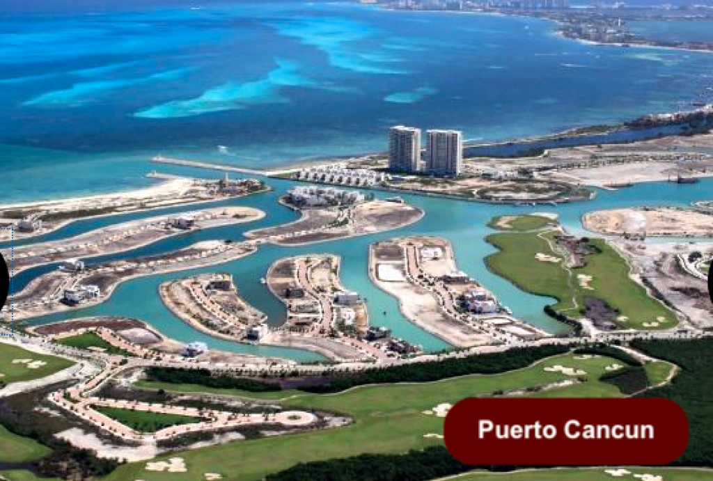 Residencia de lujo sobre el agua, frente al canal de marina, vista al mar, alberca natural, en venta Puerto Cancun.