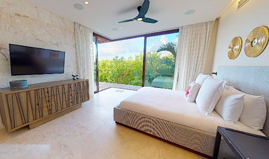 7 bedroom house steps from the beach 2 pools for sale in Playacar Phase 1.