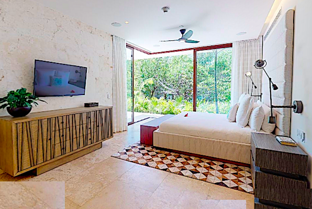 7 bedroom house steps from the beach 2 pools for sale in Playacar Phase 1.