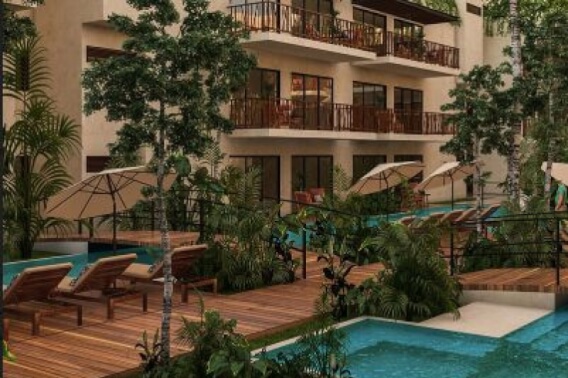 Green view condo with 32 m2 private garden, direct access to the pool from your terrace (swim up), gym, zen or yoga area, business center, Aldea Zama Neighborhood, Tulum for sale.