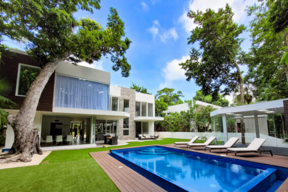 House with pool on golf course with beach club for sale Tulum Country Club.