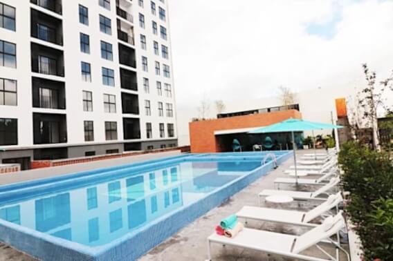 1 bedroom condo, plus study, with pool, playground for kids, swimming lane, gym, yoga terrace, outdoor work area for sale in Zona Real