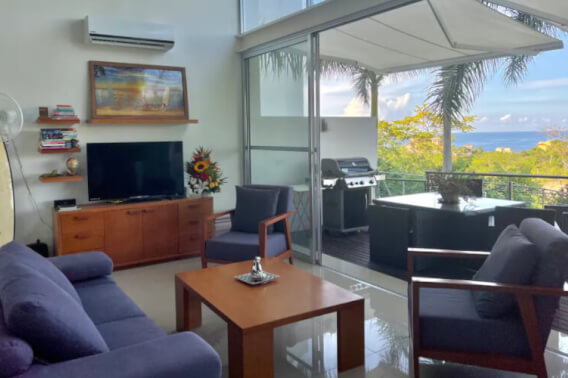 Ocean view condo with private jacuzzi, double height, full wall window, 3 pools, gym and more for sale Punta Gaviota,