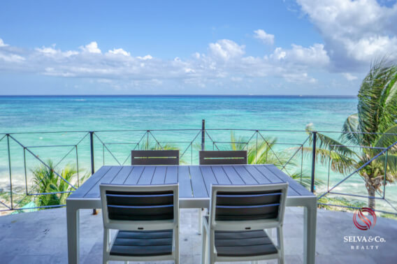 Beachfront condo, ocean view terrace with hammocks.  furnished, steps from Fifth Avenue, for sale Playa del Carmen.