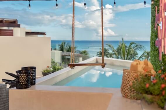 Beachfront penthouse with private pool and swing overlooking the ocean, access to the sea, beach club, gym, business center, concierge